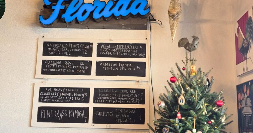 THIS IS AN IMAGE OF THE INSIDE OF THE BLUE HEN CAFE IN ST. AUGUSTINE, FLORIDA DAILY SPECIALS SIGN