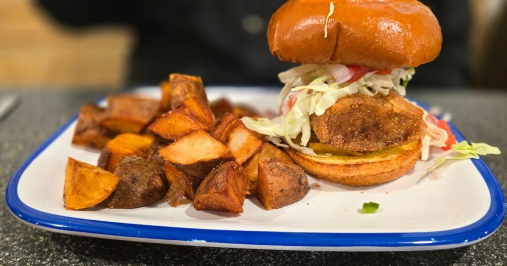 THIS IS AN IMAGE OF THE BAJA FISH SANDWICH AT THE BLUE HEN CAFE IN ST. AUGUSTINE, FLORIDA