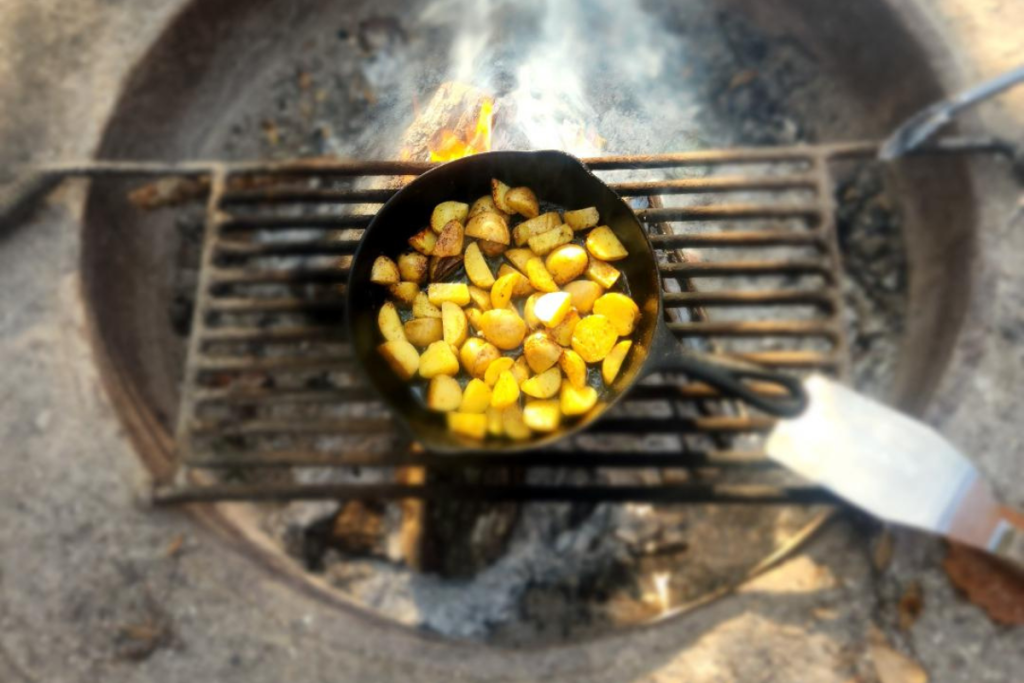ABSOLUTE BEST CAMPFIRE FOOD SKILLET OF POTATOES ON FIRE