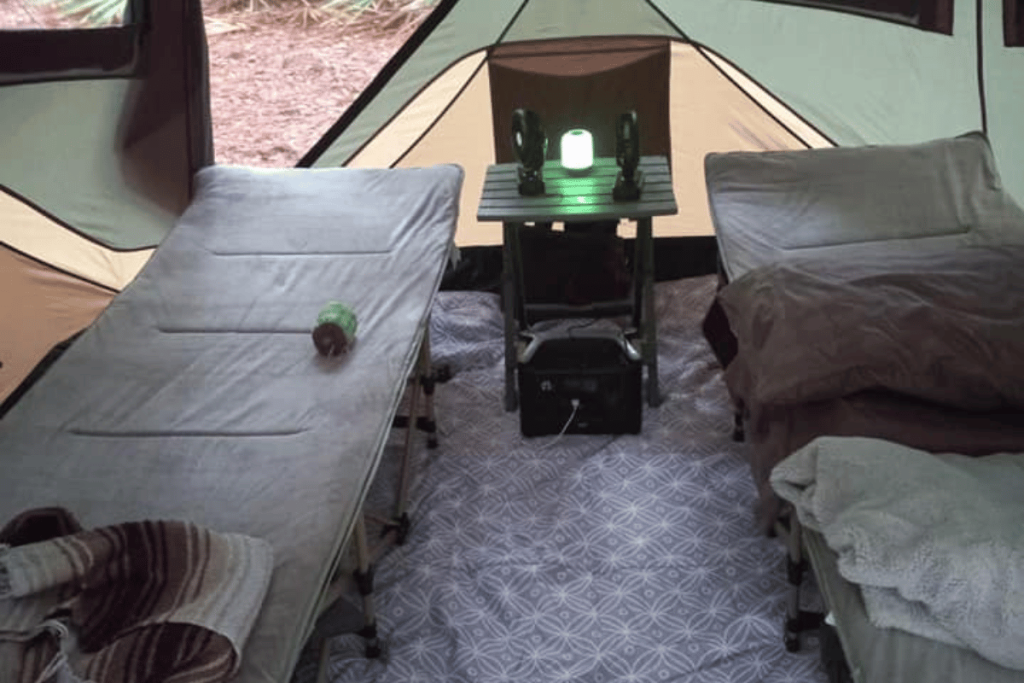 LET'S GET LIT EASY OUTDOOR CAMPSITE LIGHTING IDEAS biolite on table between two cots