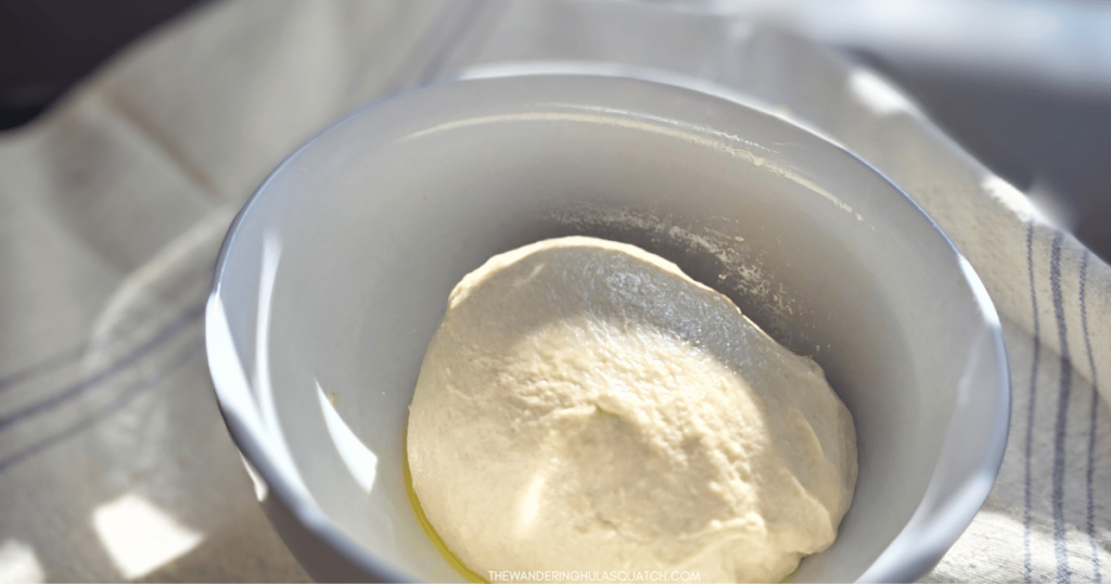 bread dough in bowl ready to rise