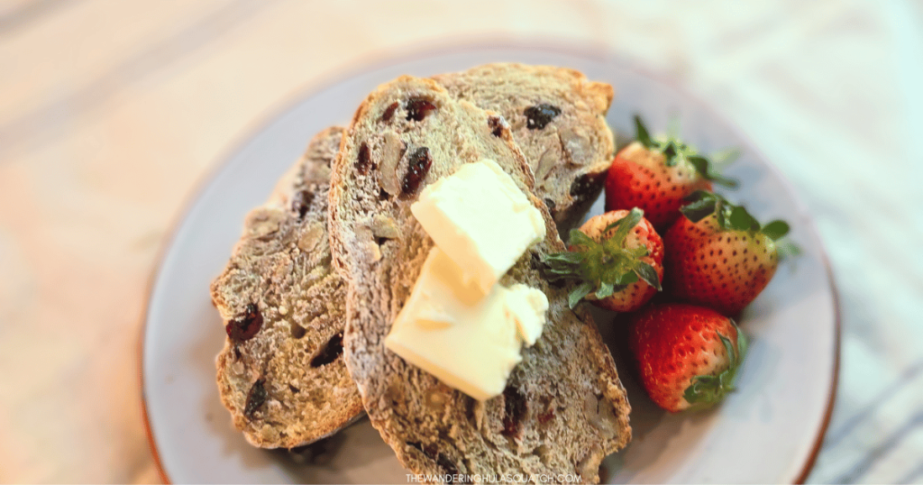 cranberry walnut bread ultimate toast on a plate