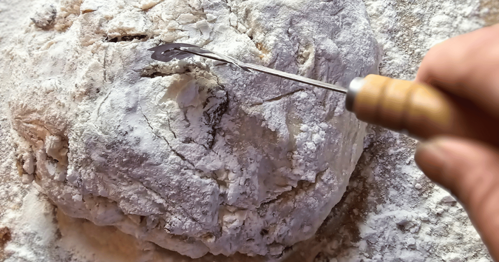 scoring top of bread dough