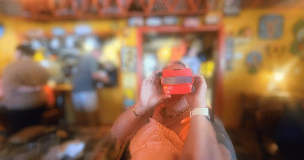 ROAD TRIP TO SATCHEL'S BEST PIZZA IN GAINESVILLE, FL LADY LOOKING THROUGH A VIEW FINDER