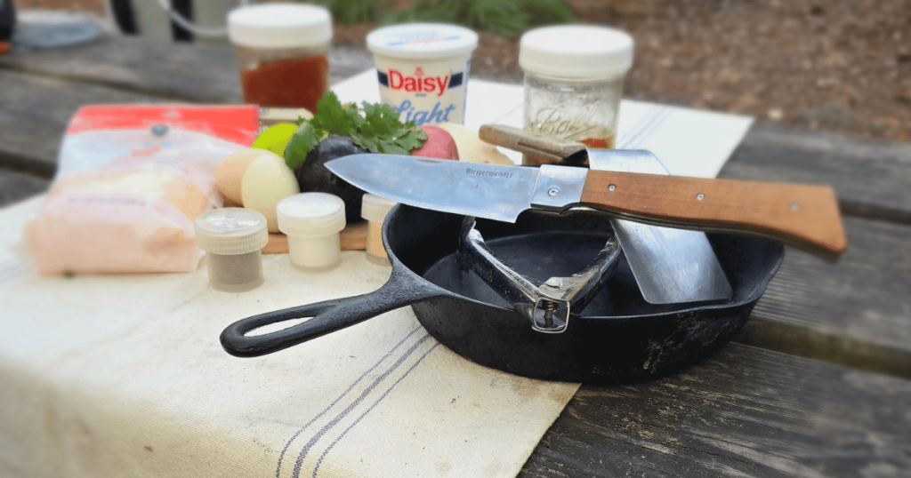 EASY CAMPFIRE BREAKFAST TACOS YOUR NEW CAMPING RECIPE INGREDIENTS ON A PICNIC TABLE