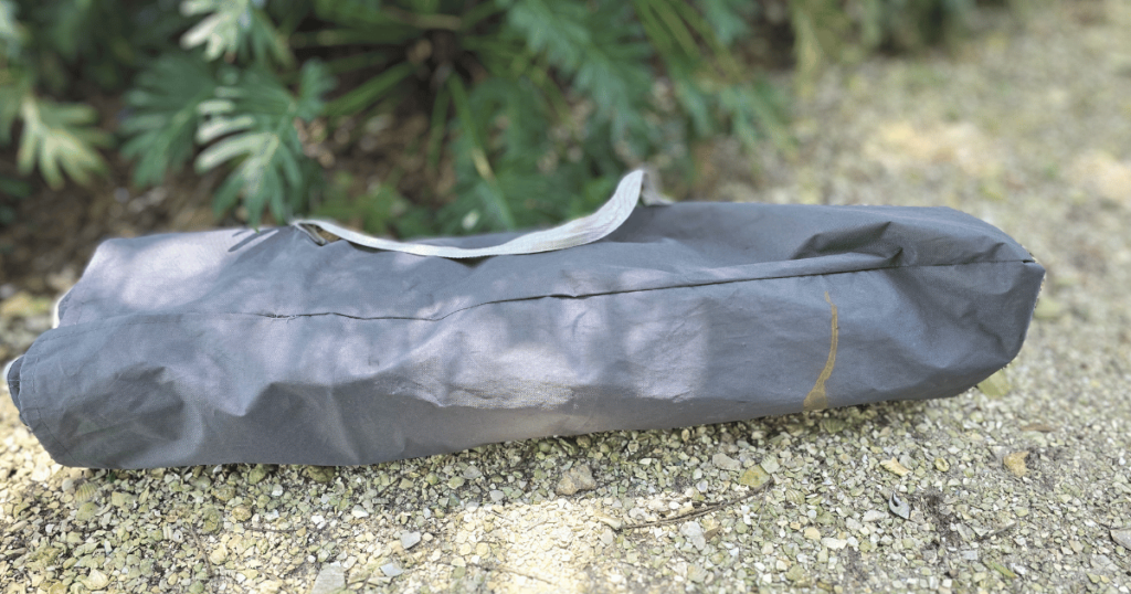 BEST OUTDOOR CAMPING COT FOR YOUR NEXT ADVENTURE cot in bag on ground