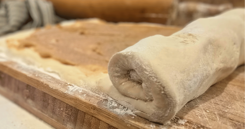 DECADENT HOMEMADE SOUR CREAM CINNAMON ROLLS RECIPE rolling dough