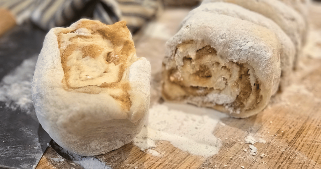 DECADENT HOMEMADE SOUR CREAM CINNAMON ROLLS RECIPE cut cinnamon rolls