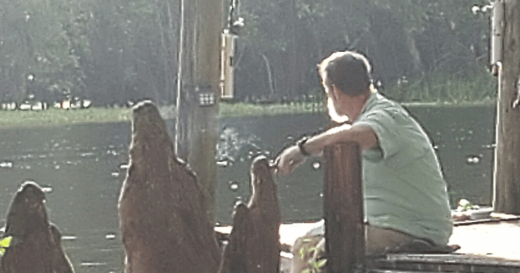 FALL OUTDOORS IN FLORIDA: GUIDE TO AUTUMN ADVENTURES man sitting on a dock on river