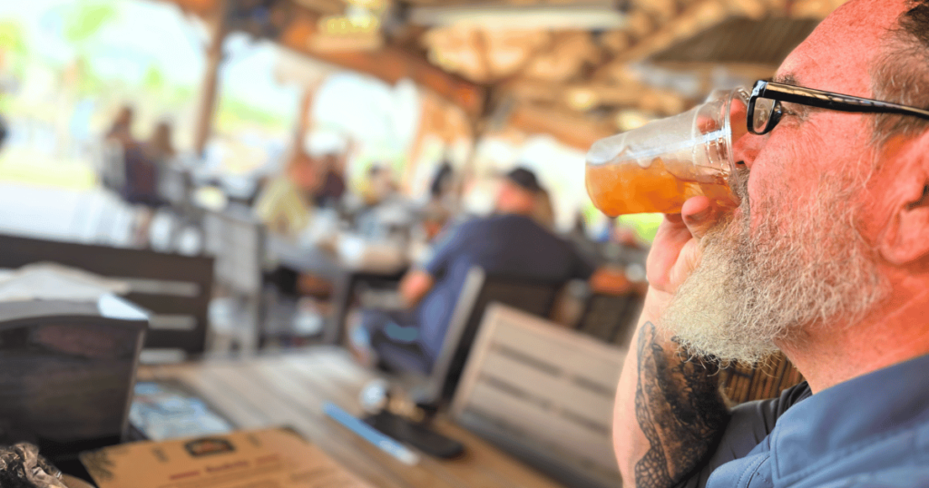 DIVE INTO CRUMPS' LANDING IN HOMOSASSA, FLORIDA man reading menu