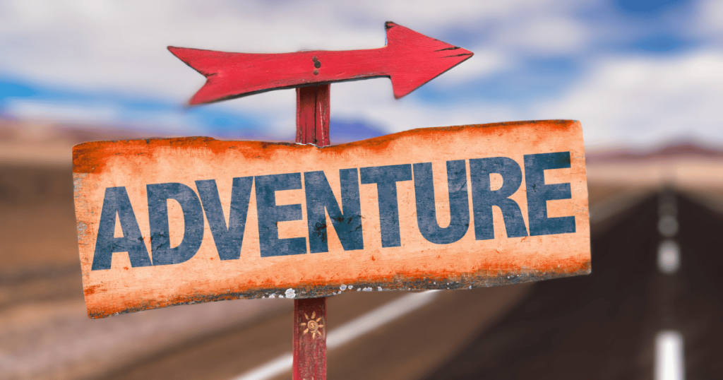 THIS IS AN IMAGE SHOWING A SIGN SAYING ADVENTURE