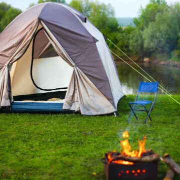 beginners guide to camping this is an image of a tent and a campfire