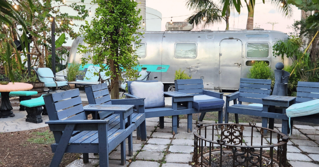 BEST SEAFOOD DIVES IN FLORIDA AIRSTREAM SITTING AREA AT CAMELLIA STREET GRILLE