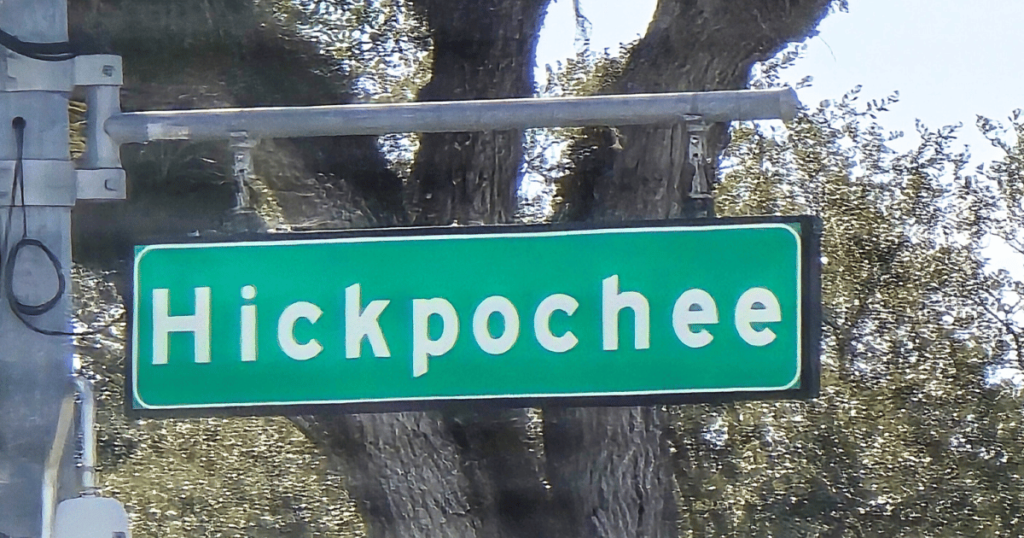 EPIC FLORIDA DAY TRIP EVERGLADES AIRBOAT RIDE AT WOOTEN'S THIS IS AN IMAGE OF A STREET SIGN