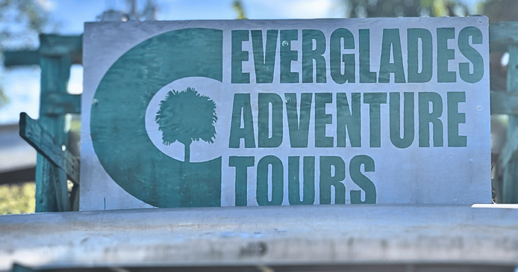 this is an image of a sign that says everglades adventure tours