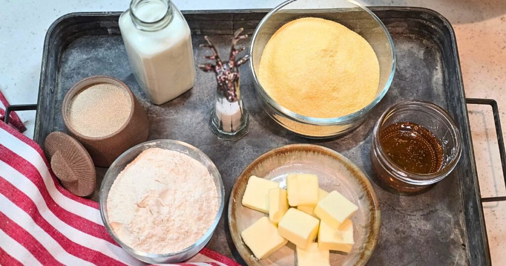 this is an image of ingredients for honey cornmeal yeast bread
