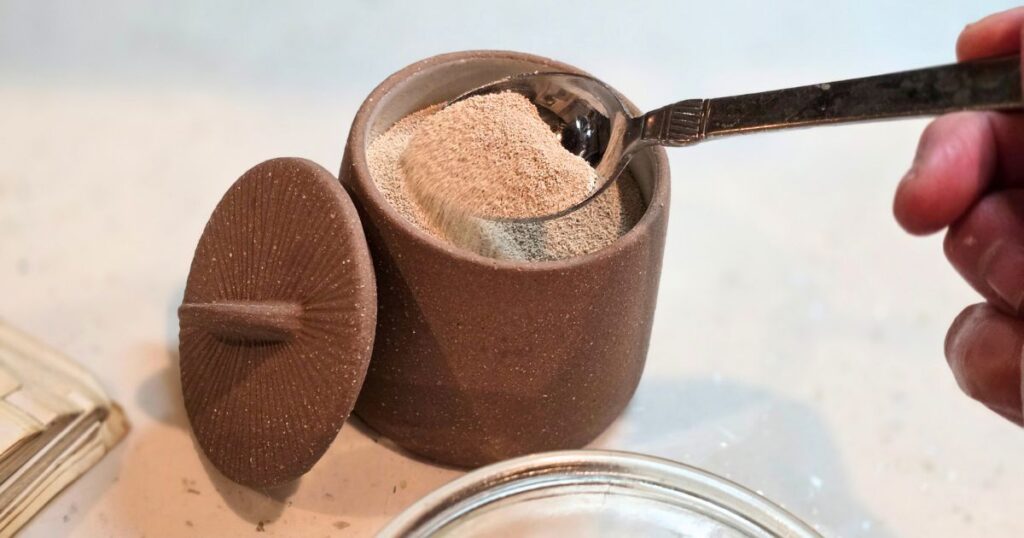 honey cornmeal yeast bread recipe spoon in yeast