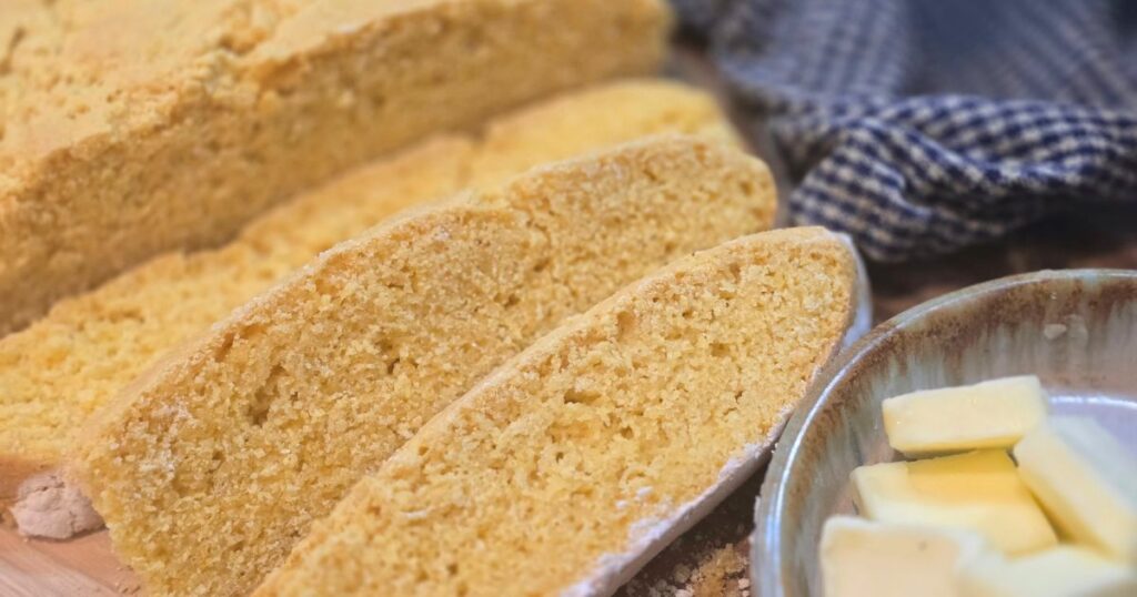 HONEY CORNMEAL YEAST BREAD RECIPE this is an image of sliced homemade cornbread