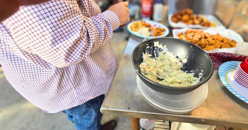 THIS IS AN IMAGE OF ALL THE SIDES AT A SOUTHERN FISH FRY