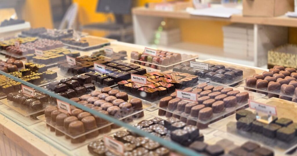 THIS IS AN IMAGE OF THE CHOCOLATE CASE AT CLAUDS CHOCOLATE IN ST. AUGUSTINE, FL