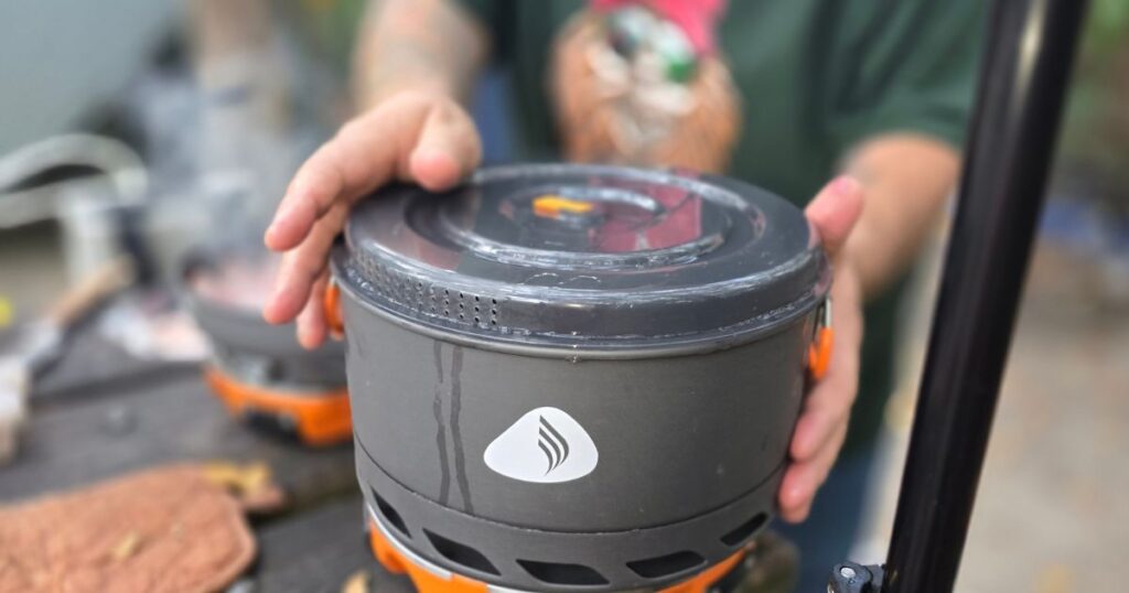 THE BEST PORTABLE CAMPING STOVES THIS IS AN IMAGE OF THE JETBOIL GENESIS BASE CAMP STOVE POT