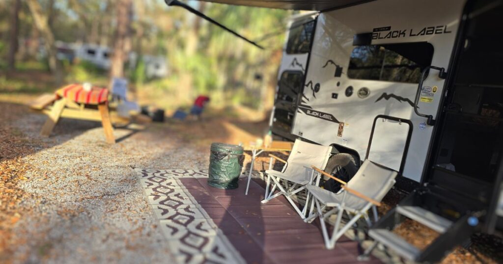 TOMOKA STATE PARK THIS IS AN IMAGE OF A CAMPER IN THE TOMOKA STATE PARK CAMPGROUND