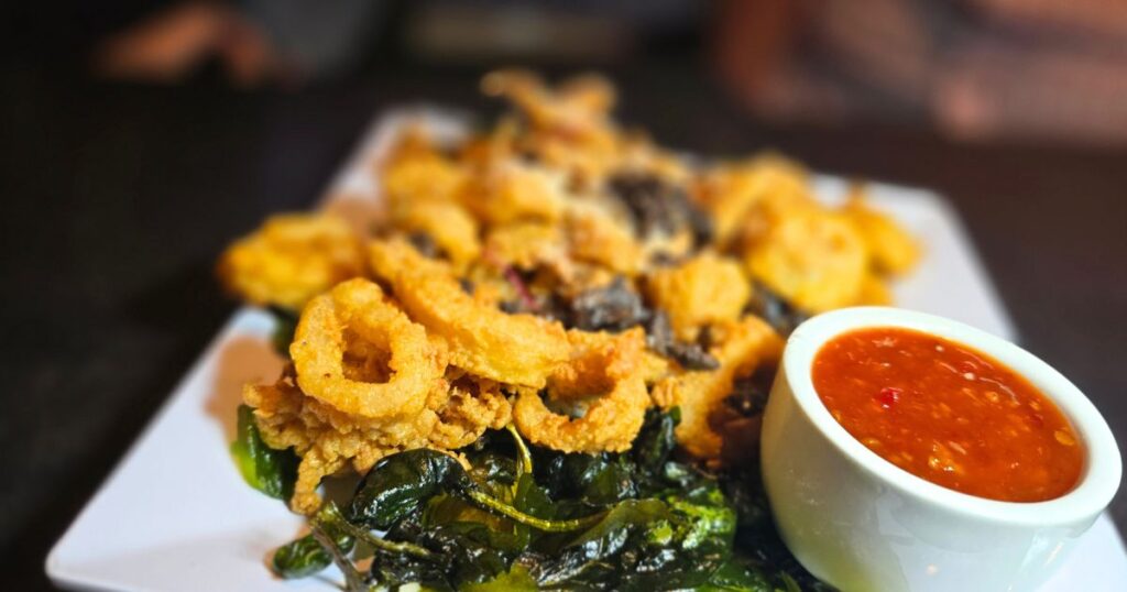 ST. AUGUSTINE HIDDEN GEM RESTAURANT WITH A VIEW IMAGE OF CALAMARI APPETIZER AT CAPS ON THE WATER