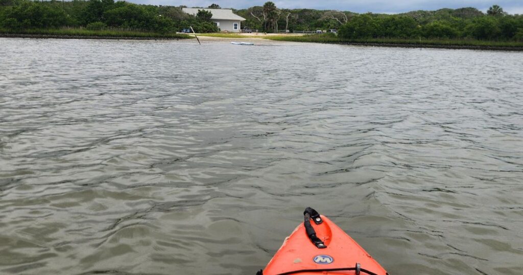 ST. AUGUSTINE HIDDEN GEM RESTAURANT WITH A VIEW IMAGE OF A KAYAK IN ST. AUGUSTINE