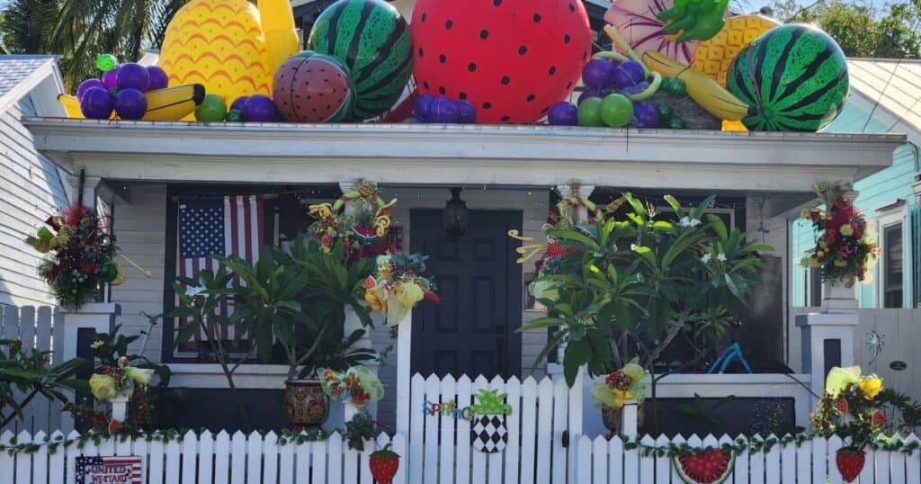Watermelon and fruit themed outdoor decoration for summer festivities.