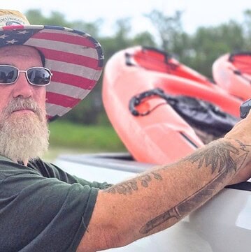 John Pennekamp Coral Reef State Park activities in the Florida Keys MAN UNLOADING KAYAKS